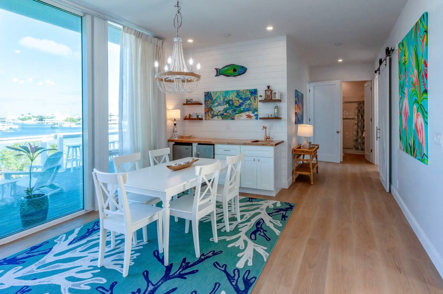 Dining area with chandelier and harbour views