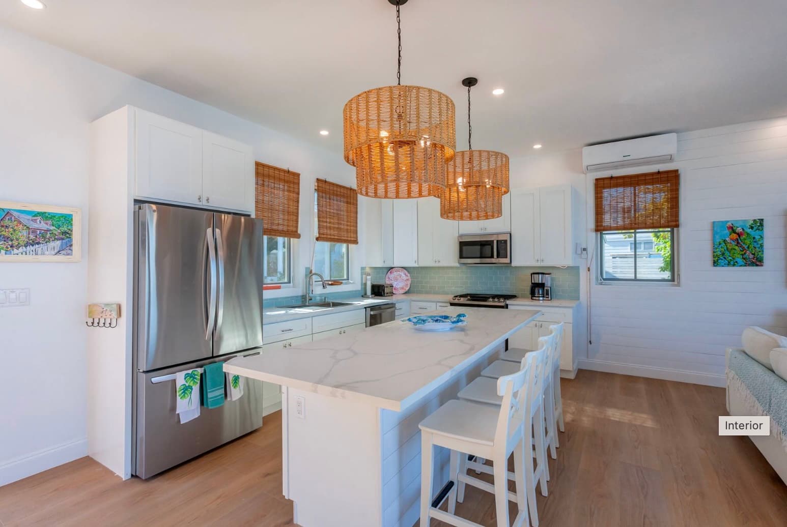 Modern kitchen with stainless steel appliances and island